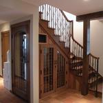 Stair case with wine cellar below. Crafted from reclaimed old growth redwood.
