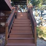 Composite decking with copper handrails.