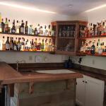 Custom bar with reclaimed redwood.