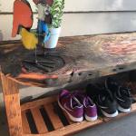Porch bench with shoe rack. Crafted from reclaimed wood. 
